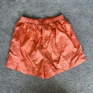 The Body Co orange nylon shorts size XL